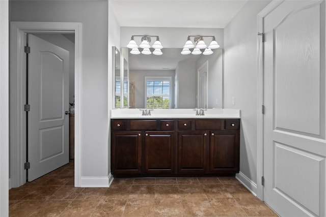 118 General Ct, Lehigh Twp, PA 16063 - full bath with double vanity, a chandelier, and baseboards