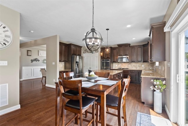 118 General Ct, Lehigh Twp, PA 16063 - dining room featuring a chandelier, dark wood-type flooring, baseboards, and recessed lighting