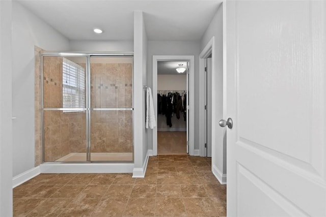 118 General Ct, Lehigh Twp, PA 16063 - bathroom featuring a shower stall, baseboards, and a walk in closet
