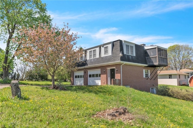 view of side of property with brick siding, roof with shingles, mansard roof, and a sunroom