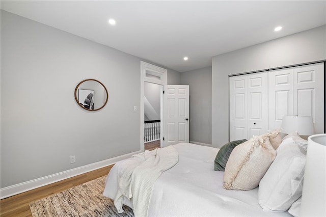 7314 Monticello St, Homewood-Brushton, PA 15208 - bedroom featuring baseboards, recessed lighting, wood finished floors, and a closet