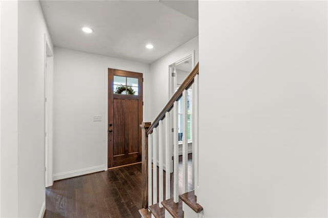entrance foyer with baseboards, recessed lighting, stairs, and hardwood / wood-style flooring