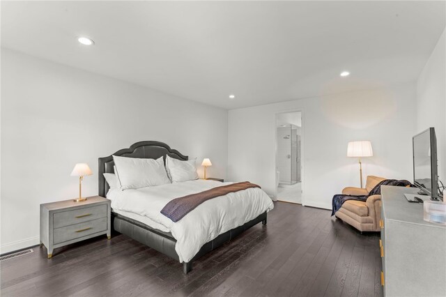bedroom featuring dark wood-style flooring, baseboards, visible vents, and recessed lighting