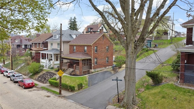 11 N Grandview Ave, Crafton, PA 15205 - view of front facade with a residential view and brick siding