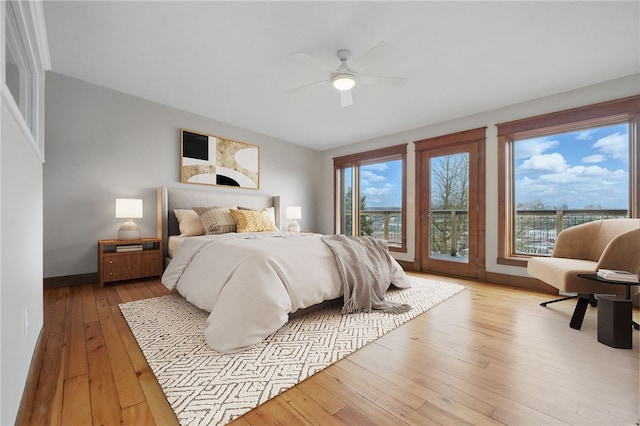 2715 Mission St, South Side, PA 15203 - bedroom with wood-type flooring, baseboards, ceiling fan, and access to exterior