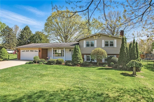 3640 Ridgewood Dr, Hermitage, PA 16148 - split level home with a chimney, a trampoline, brick siding, concrete driveway, and an attached garage