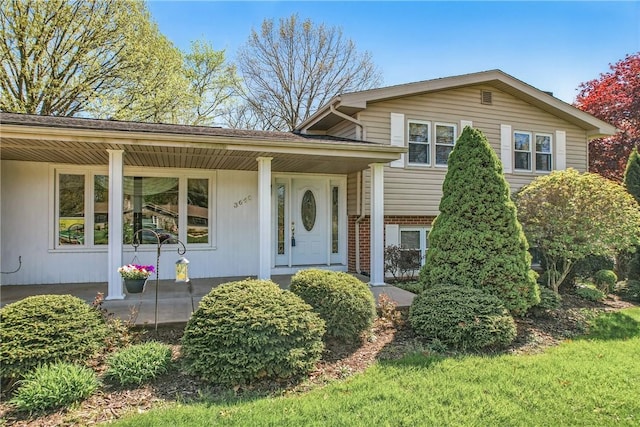 3640 Ridgewood Dr, Hermitage, PA 16148 - split level home featuring covered porch and brick siding