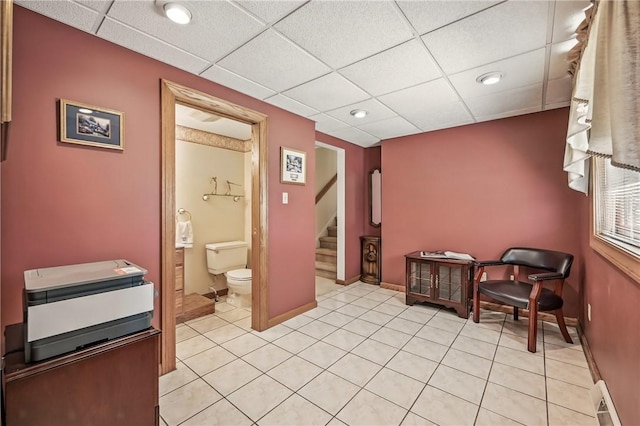3640 Ridgewood Dr, Hermitage, PA 16148 - interior space featuring light tile patterned flooring, baseboards, stairway, a paneled ceiling, and a baseboard radiator
