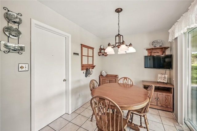 3640 Ridgewood Dr, Hermitage, PA 16148 - dining room with light tile patterned floors and a chandelier
