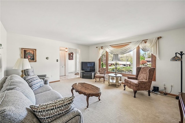 3640 Ridgewood Dr, Hermitage, PA 16148 - living room featuring baseboards and light carpet