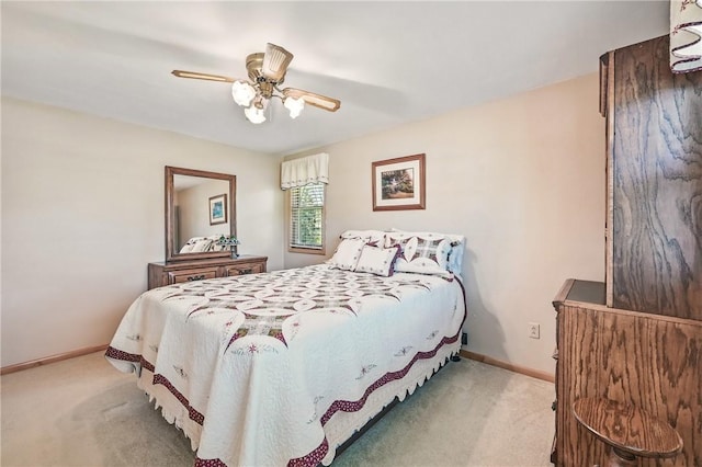3640 Ridgewood Dr, Hermitage, PA 16148 - bedroom with baseboards, a ceiling fan, and light carpet