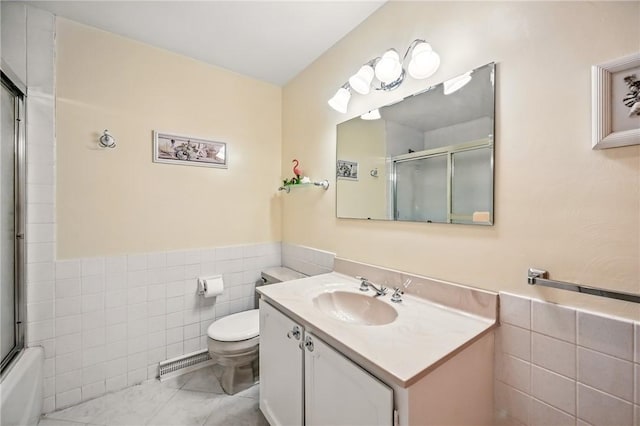 3640 Ridgewood Dr, Hermitage, PA 16148 - bathroom with tile walls, a wainscoted wall, toilet, and tile patterned floors