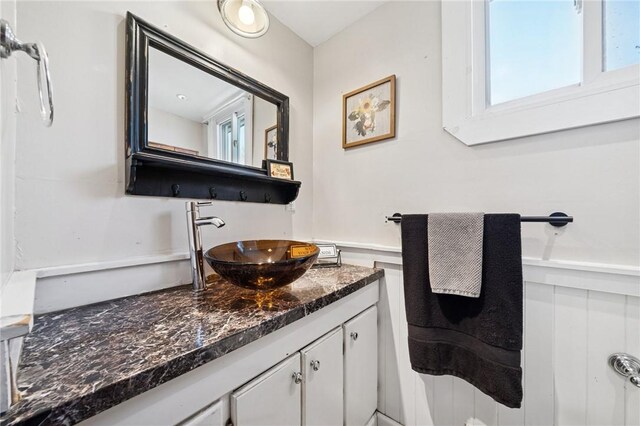 bathroom with a wealth of natural light and vanity