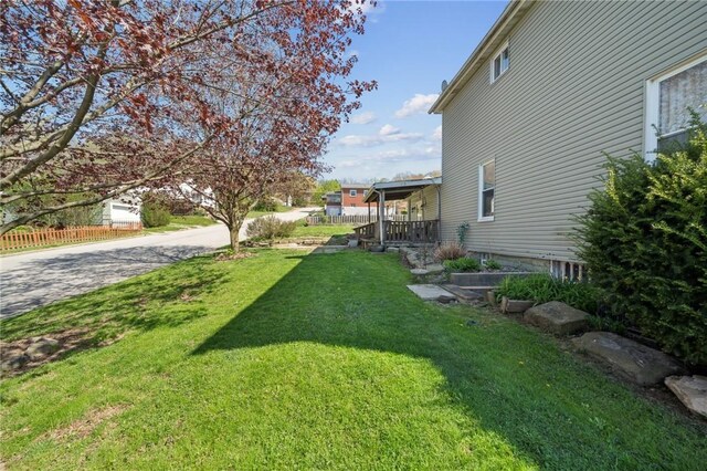 view of yard featuring fence