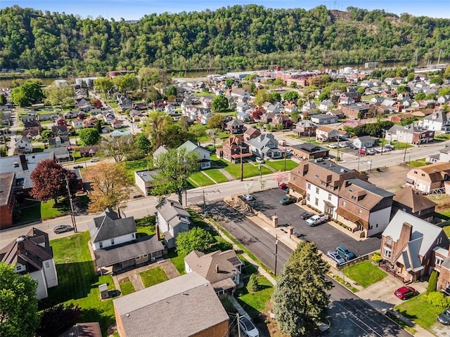 birds eye view of property with a residential view