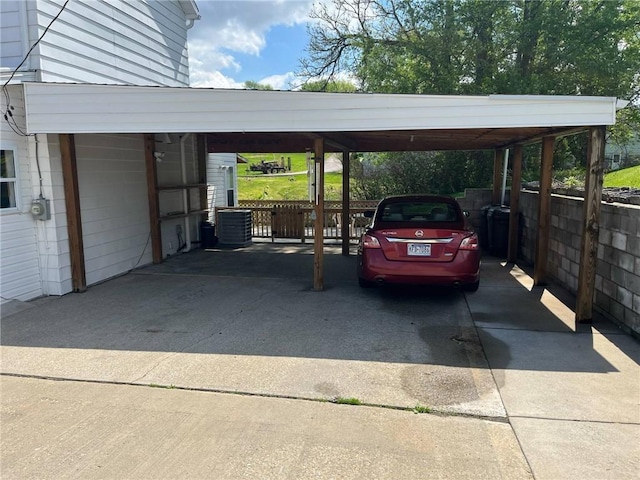 view of vehicle parking featuring concrete driveway