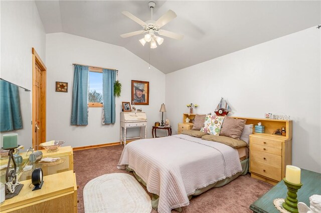 carpeted bedroom featuring baseboards, ceiling fan, and lofted ceiling