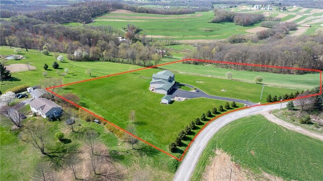 bird's eye view with a rural view