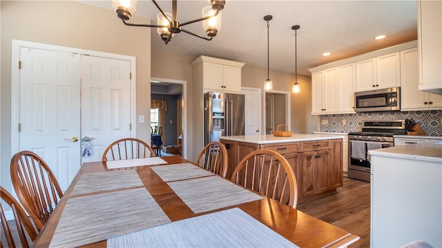 107 Skyview Dr, Buffalo Twp But, PA 16055 - dining room with recessed lighting, a notable chandelier, and dark wood-style floors