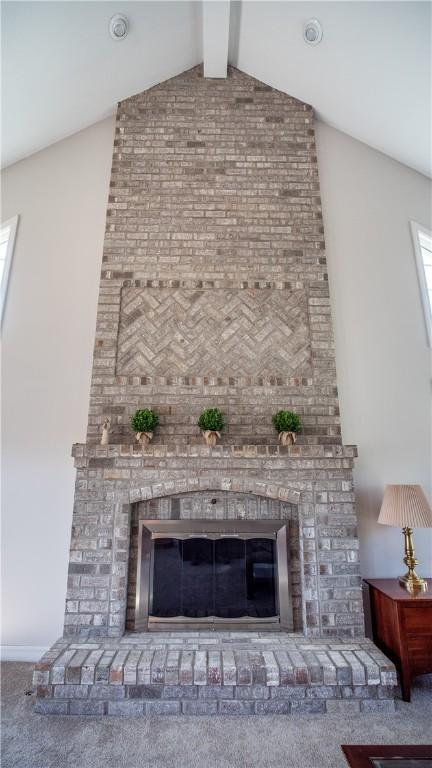 107 Skyview Dr, Buffalo Twp But, PA 16055 - room details with carpet, a fireplace, and beam ceiling