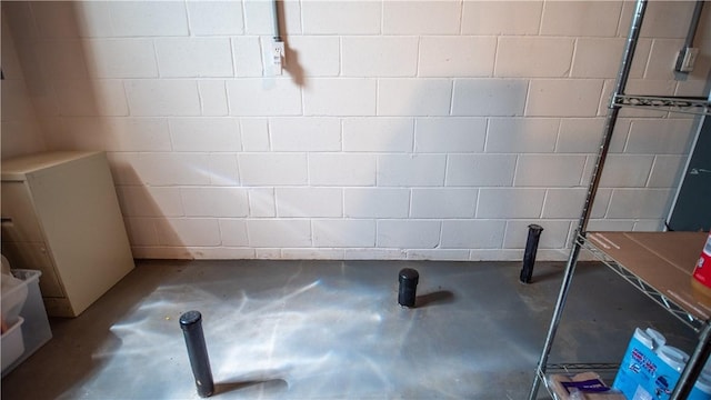 107 Skyview Dr, Buffalo Twp But, PA 16055 - interior space featuring concrete block wall and concrete floors