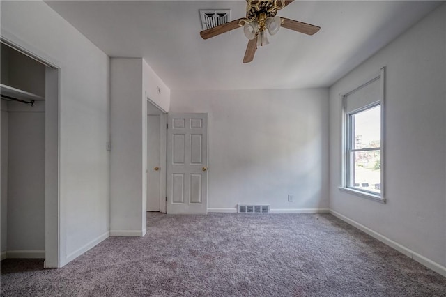 616 Evans Ave, Mckeesport, PA 15132 - unfurnished bedroom with carpet, baseboards, and a ceiling fan