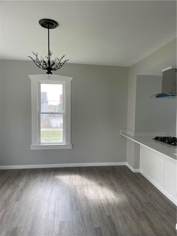280 Spruce, Sharon, PA 16146 - unfurnished dining area featuring baseboards, dark wood finished floors, and a notable chandelier