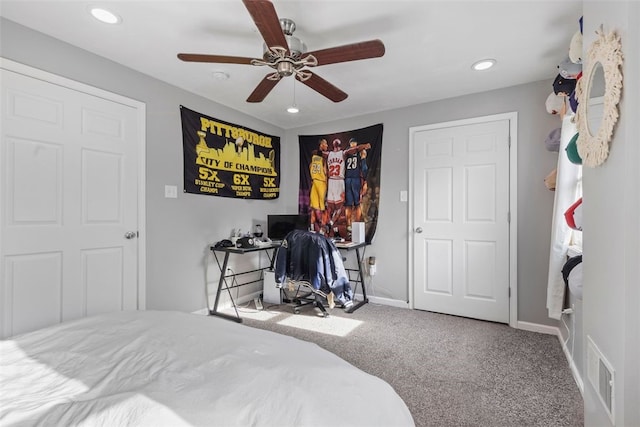 carpeted bedroom with recessed lighting, baseboards, visible vents, and a ceiling fan