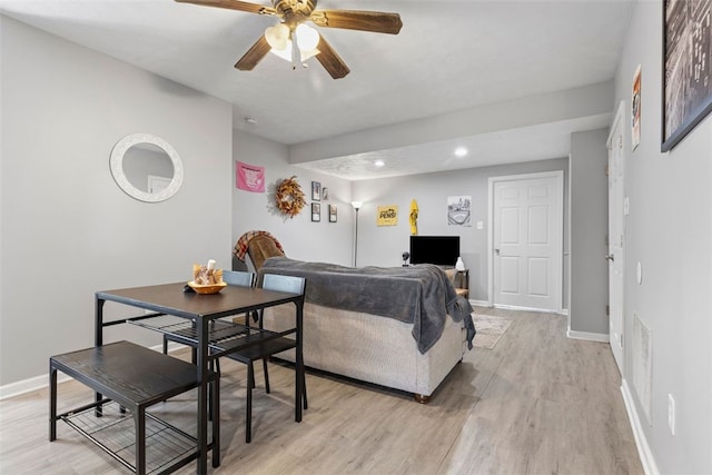 living area with recessed lighting, baseboards, ceiling fan, and light wood-type flooring