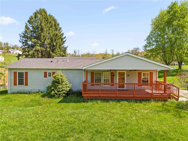 297 Rainey Rd, Somerset Twp, PA 15330 - back of property featuring a yard, ceiling fan, and roof with shingles
