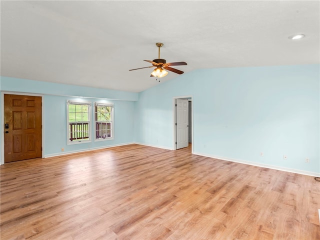 297 Rainey Rd, Somerset Twp, PA 15330 - empty room with baseboards, ceiling fan, vaulted ceiling, and light wood-style flooring