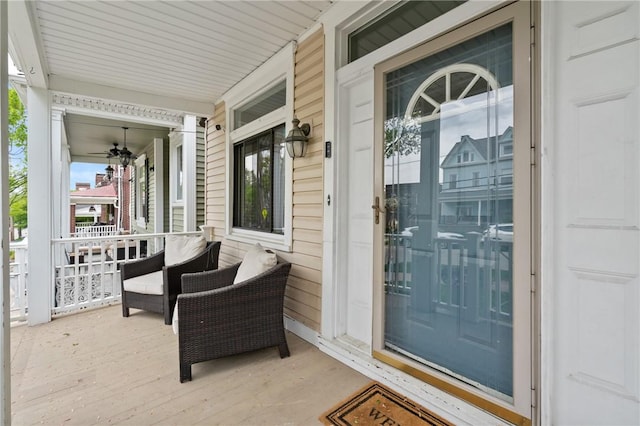 view of exterior entry with a porch