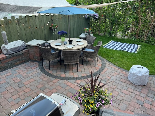 view of patio / terrace with fence and outdoor dining area