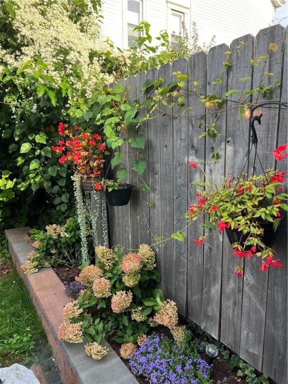 exterior details featuring fence