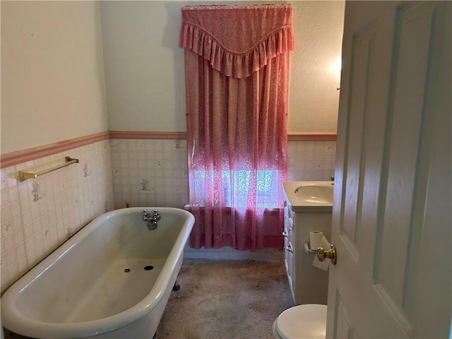 460 E Prospect Ave, City Of Washington, PA 15301 - bathroom featuring vanity, wainscoting, toilet, tile walls, and a soaking tub