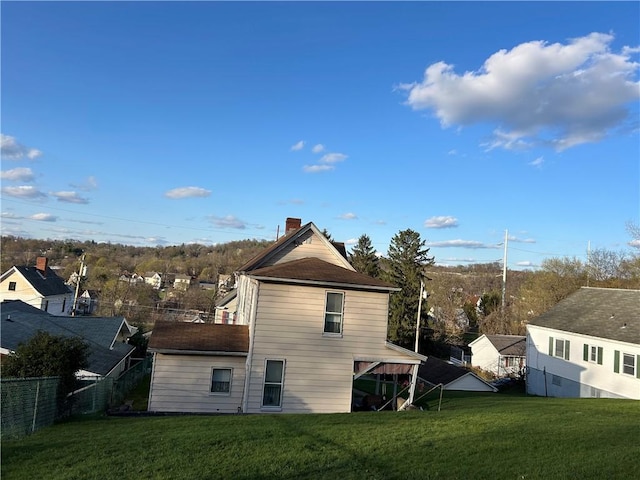 460 E Prospect Ave, City Of Washington, PA 15301 - back of property featuring a lawn, fence, and a chimney