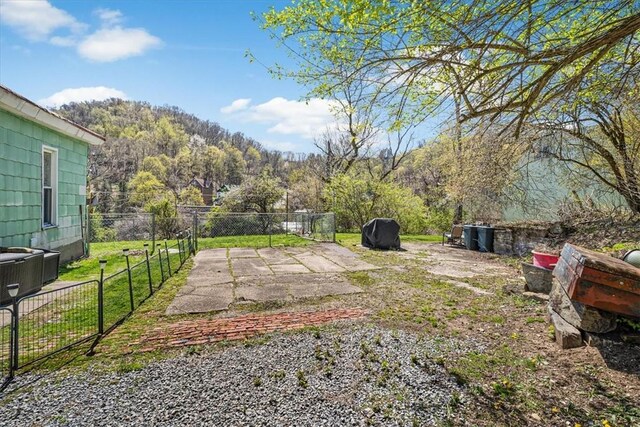 101 Clara St, Millvale, PA 15209 - view of yard with fence and a patio area