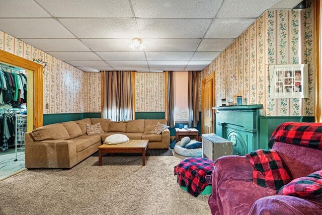 101 Clara St, Millvale, PA 15209 - living area with carpet flooring, wainscoting, wallpapered walls, and a drop ceiling