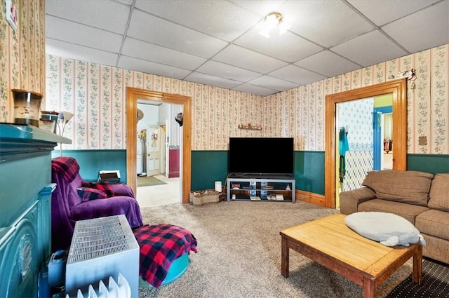 101 Clara St, Millvale, PA 15209 - carpeted living area featuring a wainscoted wall, wallpapered walls, and a paneled ceiling