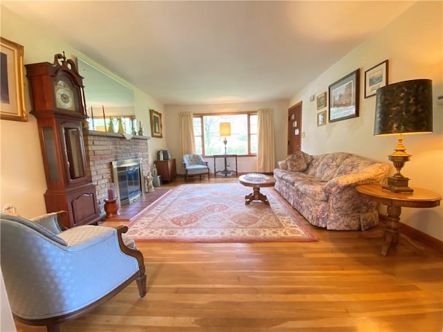 16 Gruber Rd, Hempfield Twp Mer, PA 16125 - living room featuring wood finished floors and a fireplace