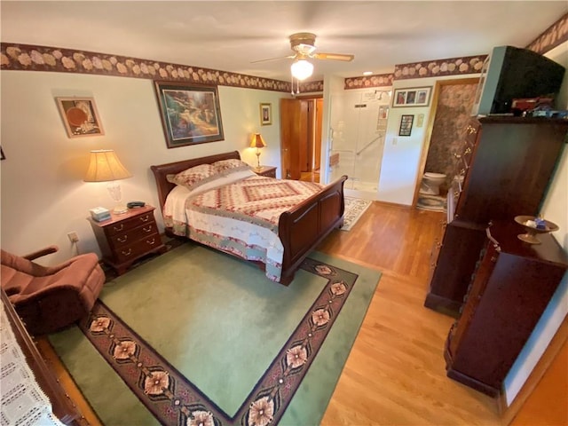 bedroom featuring ceiling fan and wood finished floors