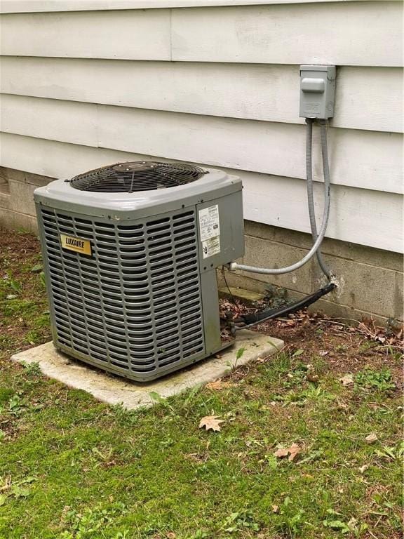 exterior details featuring central AC