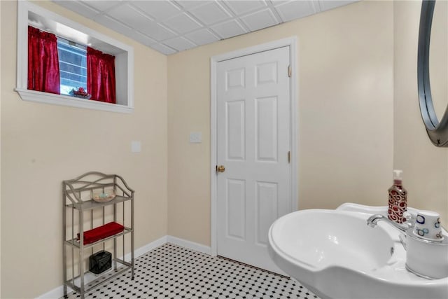 204 Salt Works Rd, Lancaster Twp, PA 16037 - bathroom featuring baseboards and a sink