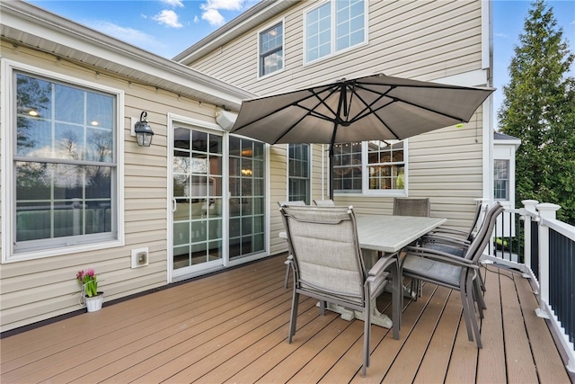 deck featuring outdoor dining area