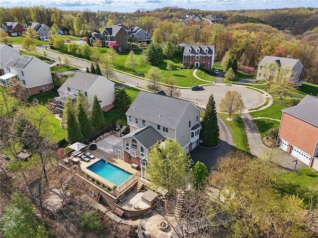 birds eye view of property with a residential view
