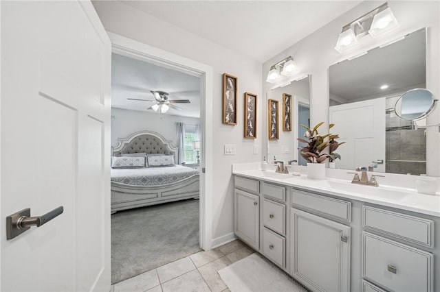 406 Spruce Ln, Chartiers, PA 15342 - ensuite bathroom featuring connected bathroom, a sink, tile patterned flooring, double vanity, and a ceiling fan