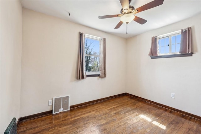 413 Pasadena Dr, Port Vue, PA 15133 - empty room featuring baseboards, ceiling fan, wood-type flooring, and visible vents