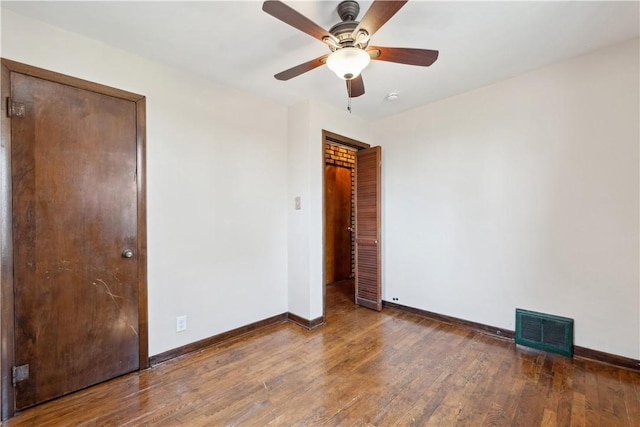 413 Pasadena Dr, Port Vue, PA 15133 - unfurnished bedroom featuring ceiling fan, baseboards, visible vents, and wood finished floors