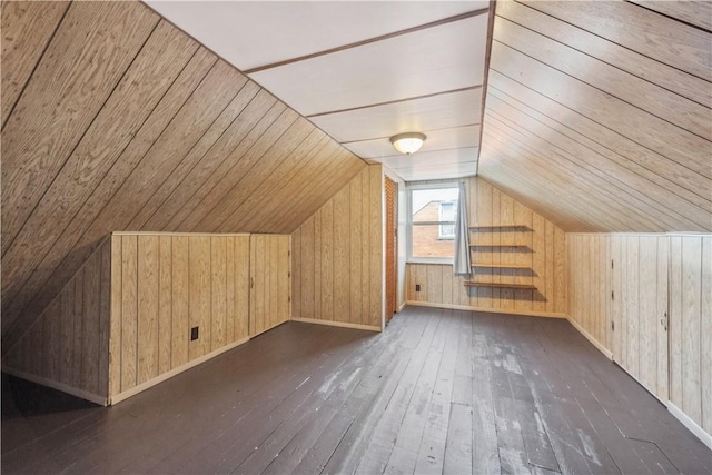 413 Pasadena Dr, Port Vue, PA 15133 - bonus room featuring wooden walls, vaulted ceiling, and dark wood finished floors
