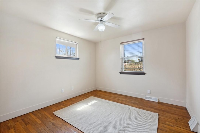 413 Pasadena Dr, Port Vue, PA 15133 - spare room with a healthy amount of sunlight, baseboards, and visible vents